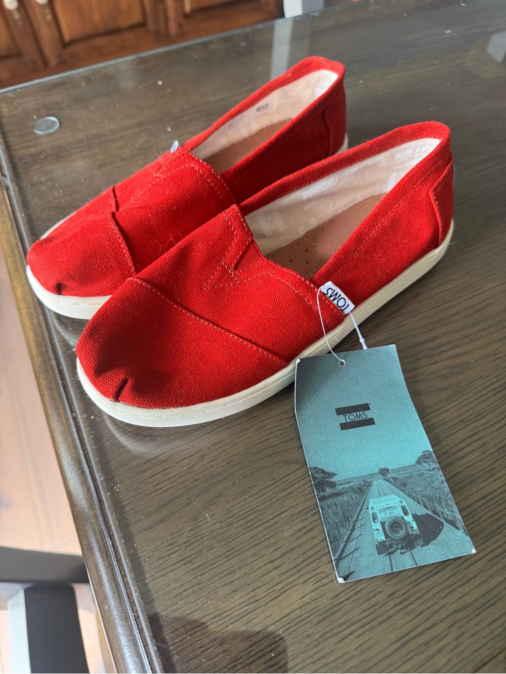 TOMS Kids Canvas Slip-Ons in Bright Red